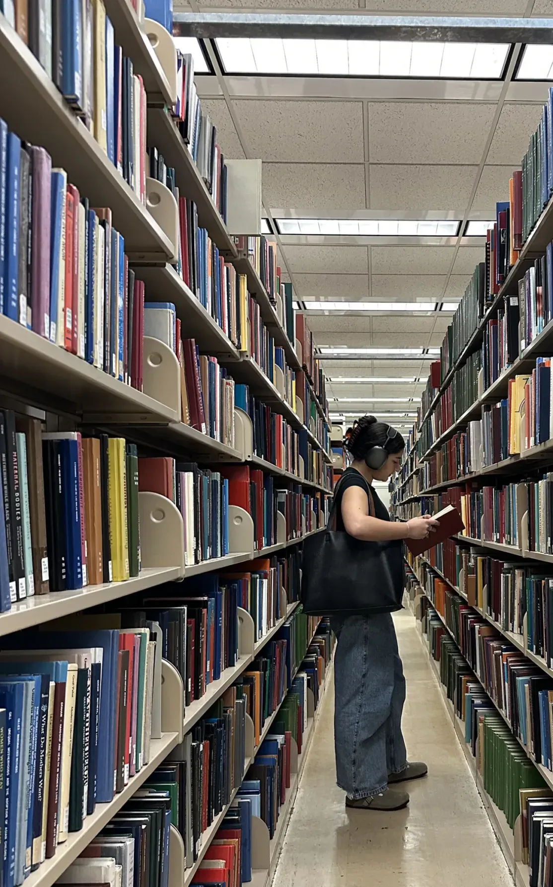 young woman in a library