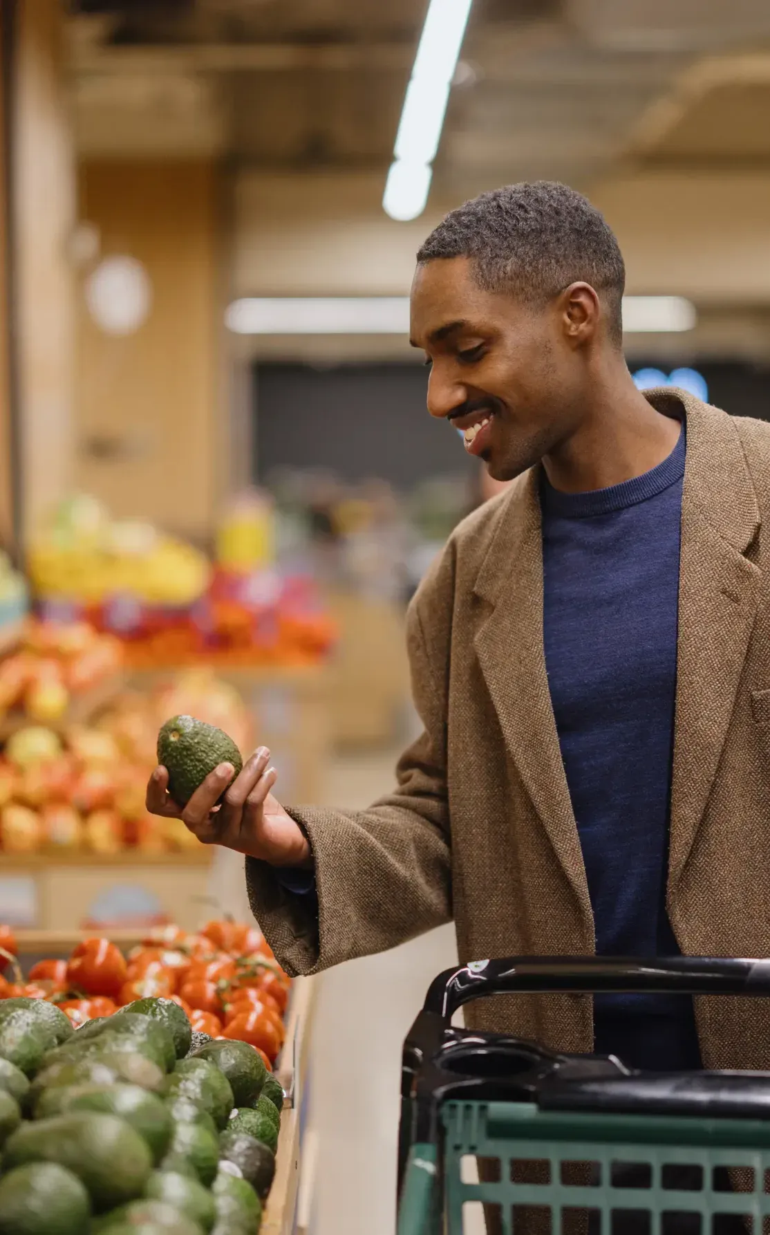 young man grocery shopping