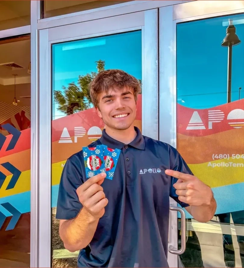 Guy holding tickets